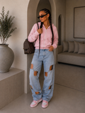 Jeans con aperture e fiocco in strass - R.a. Boutique
