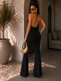 Tuta nera con gioiello oro - R.a. Boutique