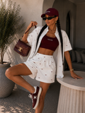 Completo con fiocchetti short e camicia - R.a. Boutique