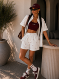 Completo con fiocchetti short e camicia - R.a. Boutique