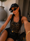 Top animalier con bottoncini - R.a. Boutique
