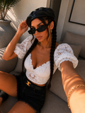 Top ricamato con dettagli floreali - R.a. Boutique