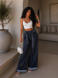 Pantalone con cravatta e risvolto - R.a. Boutique
