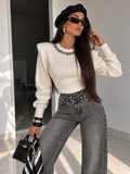 Jeans scuro con strass e risvolto - R.a. Boutique