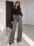 Jeans wide leg con brillantini - R.a. Boutique