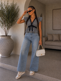 Jeans con strappi e dettaglio tasca - R.a. Boutique