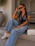 Jeans con strappi e dettaglio tasca - R.a. Boutique