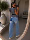 Jeans con strappi e dettaglio tasca - R.a. Boutique