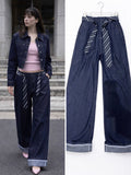 Pantalone con cravatta e risvolto - R.a. Boutique