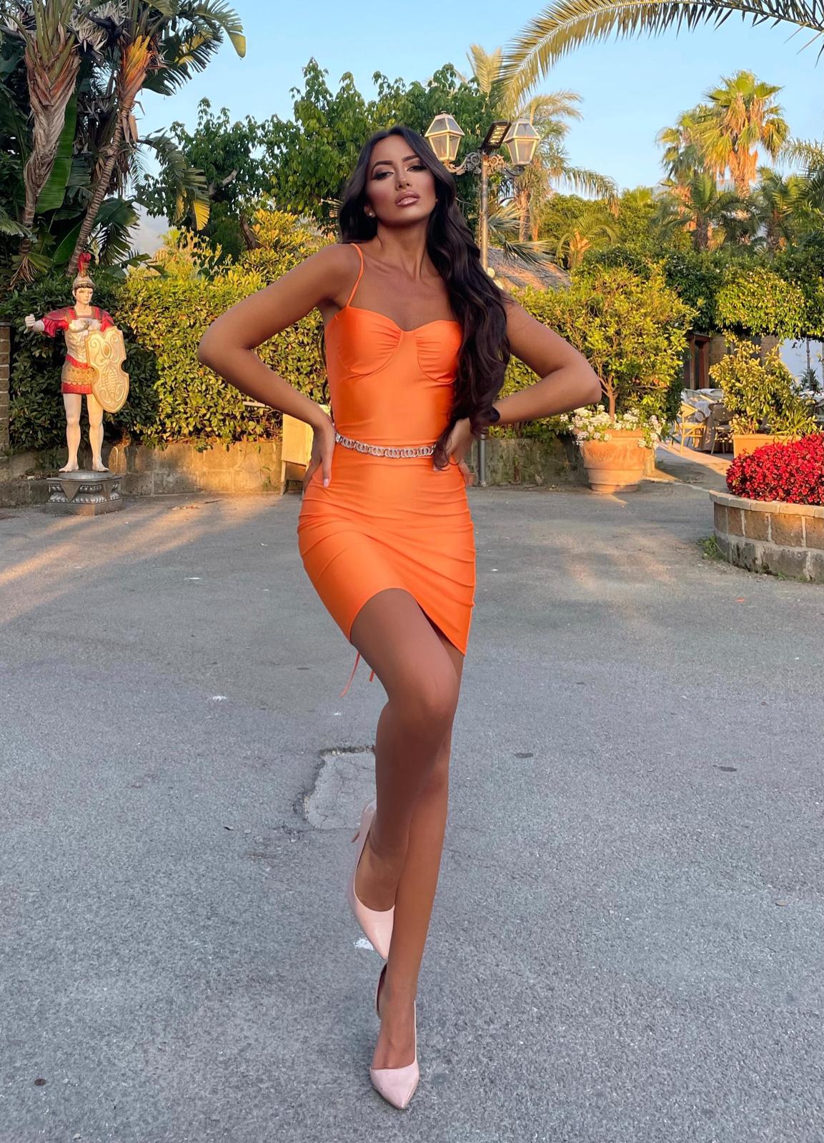 Abito arancio schiena incrociata - R.a. Boutique 