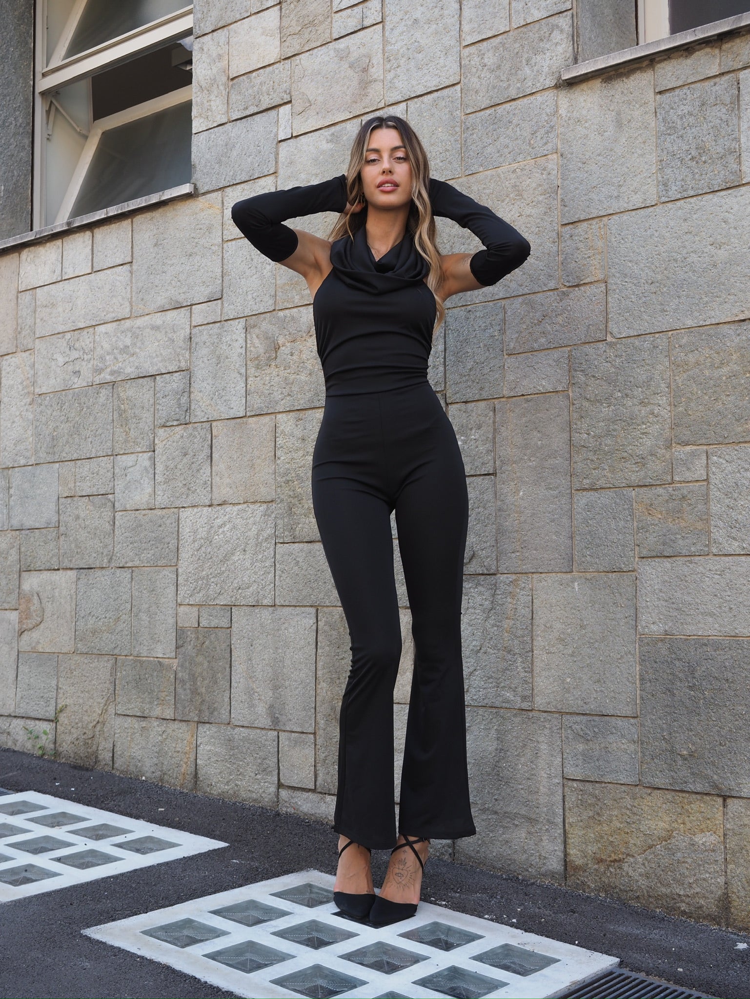 Tuta con manicotti - R.a. Boutique 