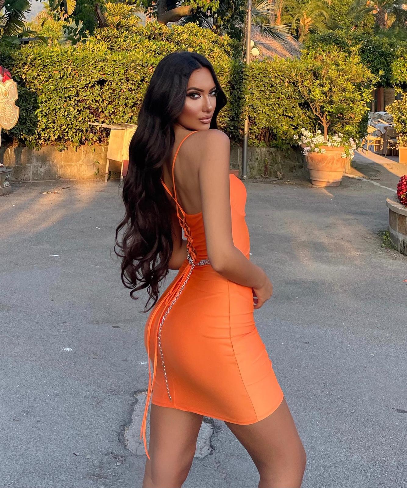 Abito arancio schiena incrociata - R.a. Boutique 