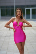 Abito Fuxia corto con catena - R.a. Boutique 