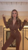 Tuta con gioiello brown - R.a. Boutique