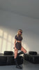 Set due pezzi maglia e short nero - R.a. Boutique