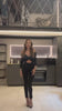 Tuta aderente con nodo nero - R.a. Boutique