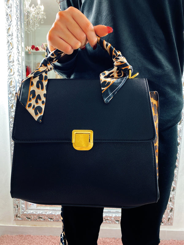 Bag a mano con dettaglio maculato