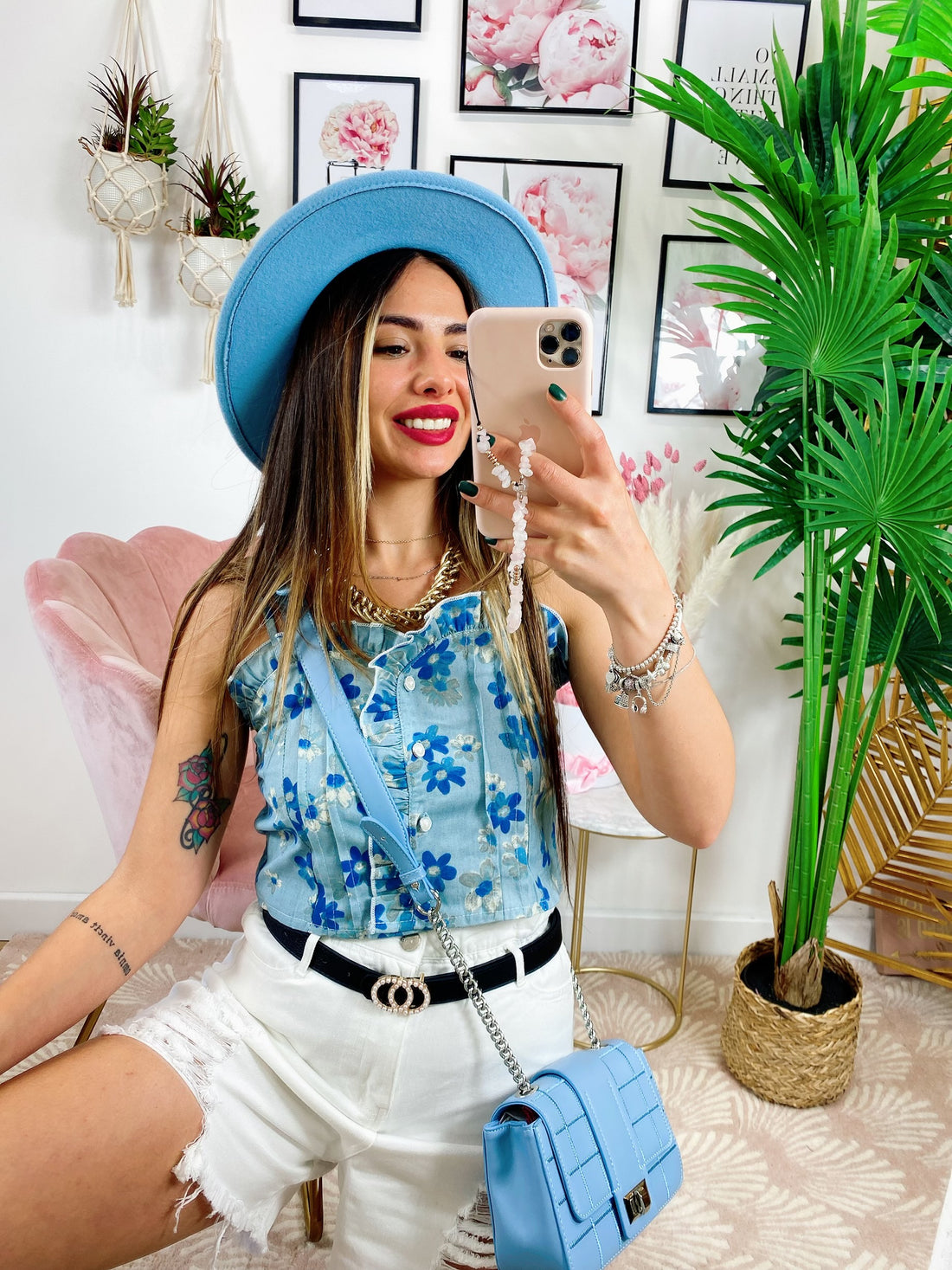 Top celeste con fiorellini - R.a. Boutique 