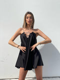 Abito in raso nero con punto luce - R.a. Boutique 