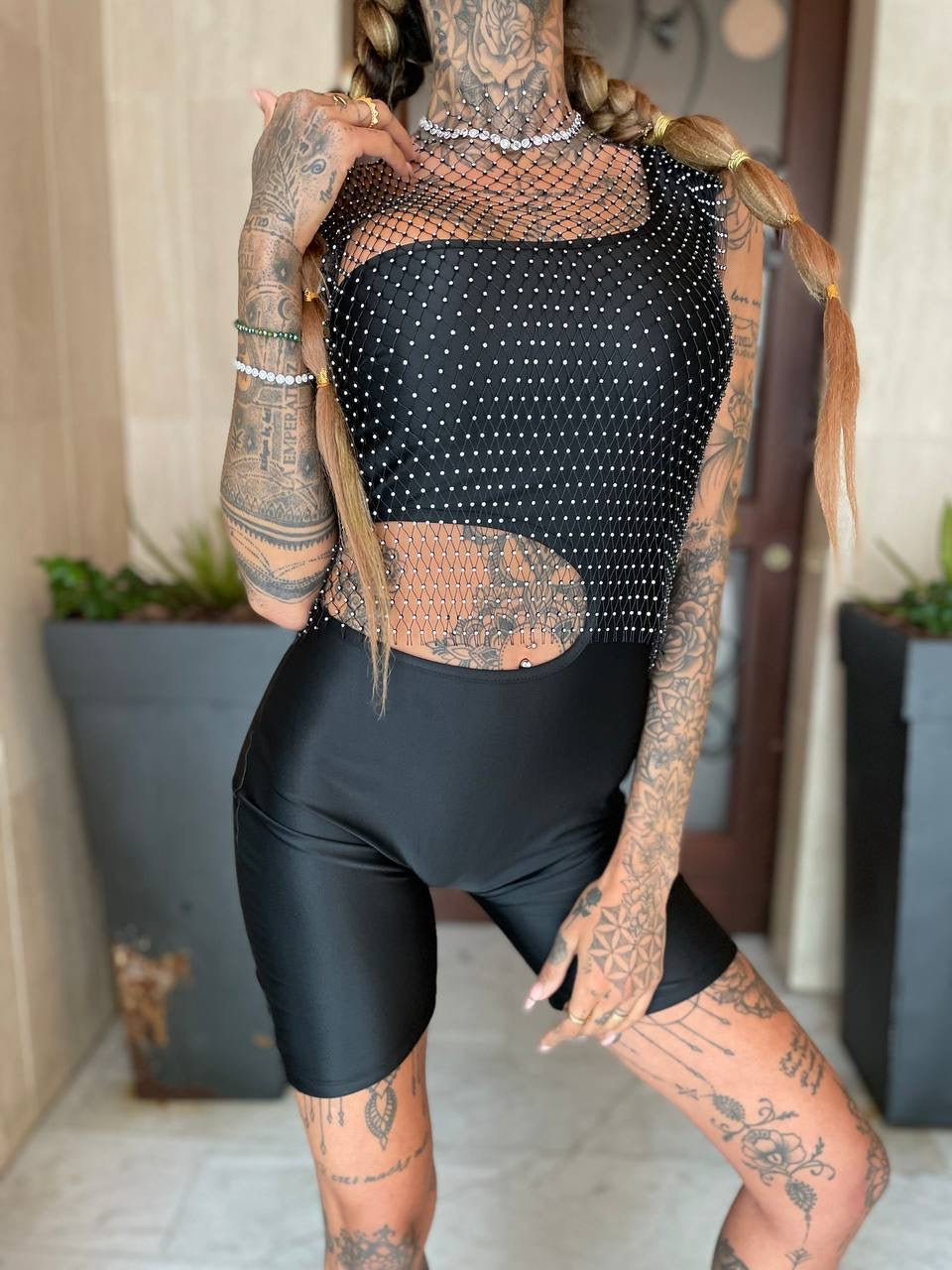 Tutina nera con oblò - R.a. Boutique 