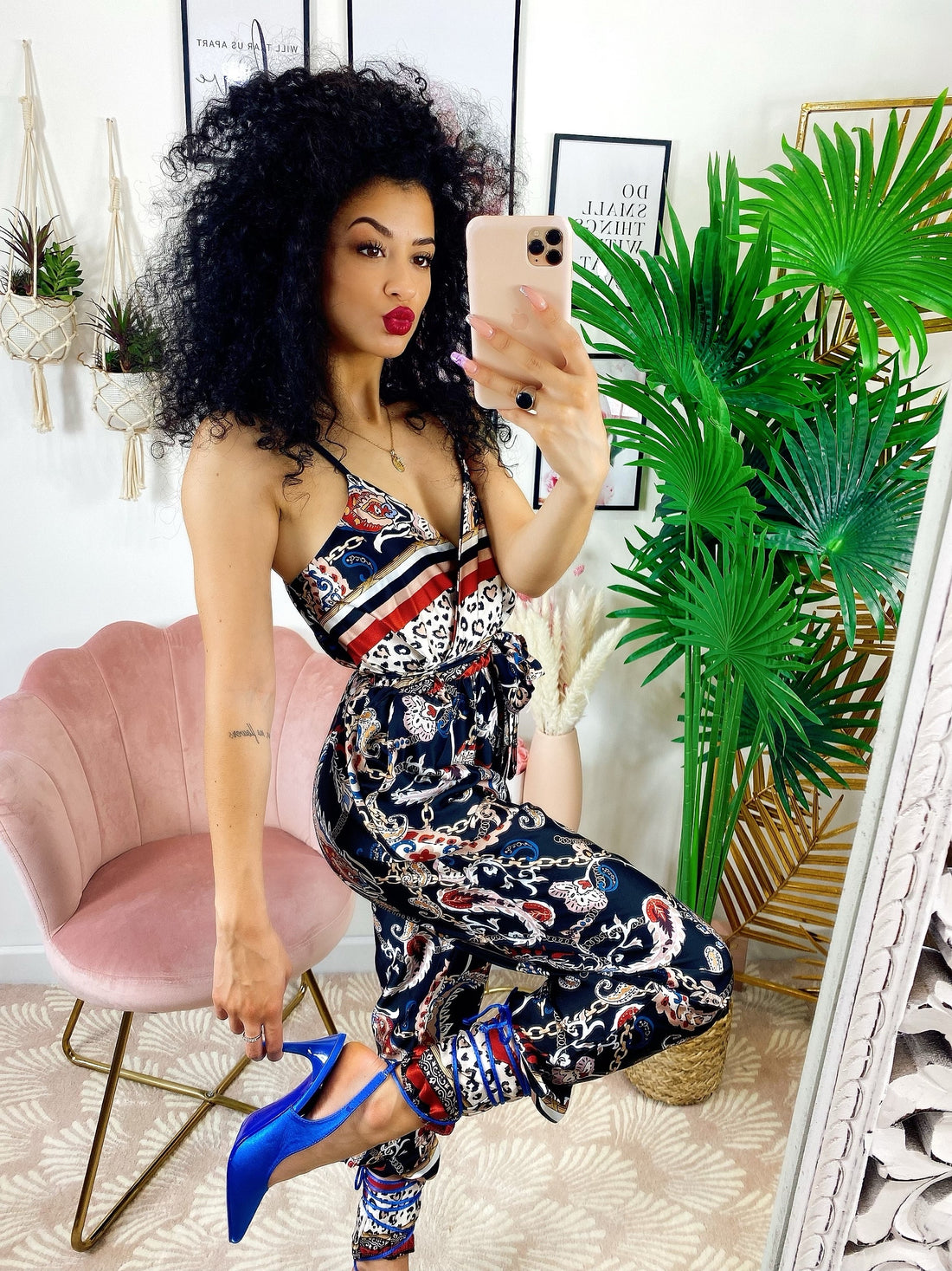 Tuta intera con stampa maculata base nera - R.a. Boutique 