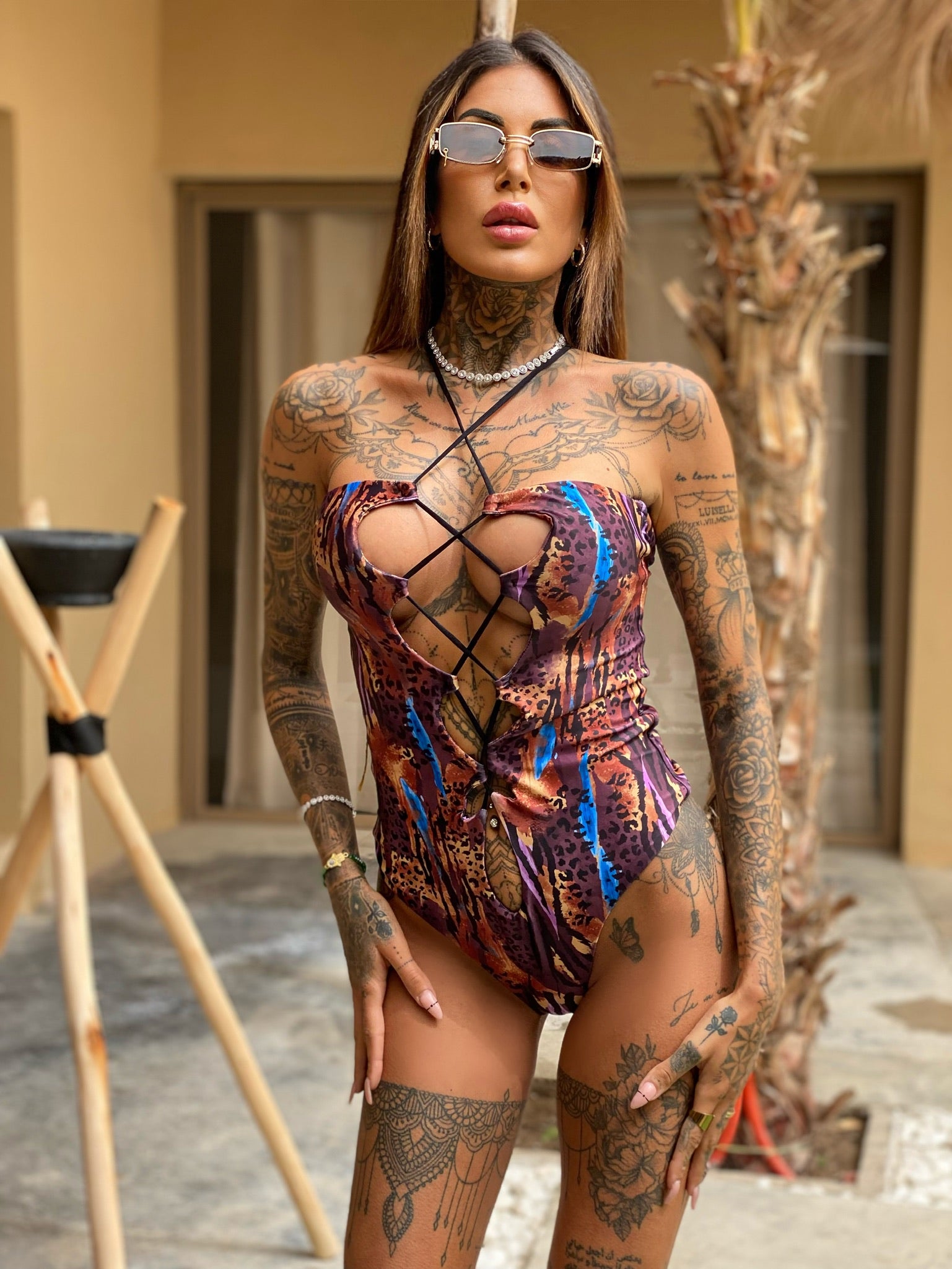 Costume intero animalier violaceo - R.a. Boutique 