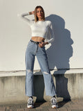 Jeans wide leg con strappi e dettaglio - R.a. Boutique 