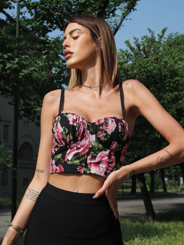 Corpino nero con fiori Fuxia