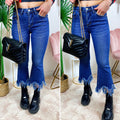 Jeans scuro con zampa larga sfrangiato - R.a. Boutique 