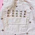 Levi’s Short Vintage bianco con borchie e strappi - R.a. Boutique 