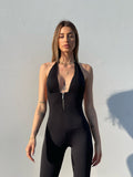 Tuta nera intera con scollatura - R.a. Boutique 