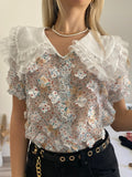 Camicia bianca a manica corta con fiori - R.a. Boutique 