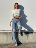 Jeans wide leg con strappi e dettaglio - R.a. Boutique 