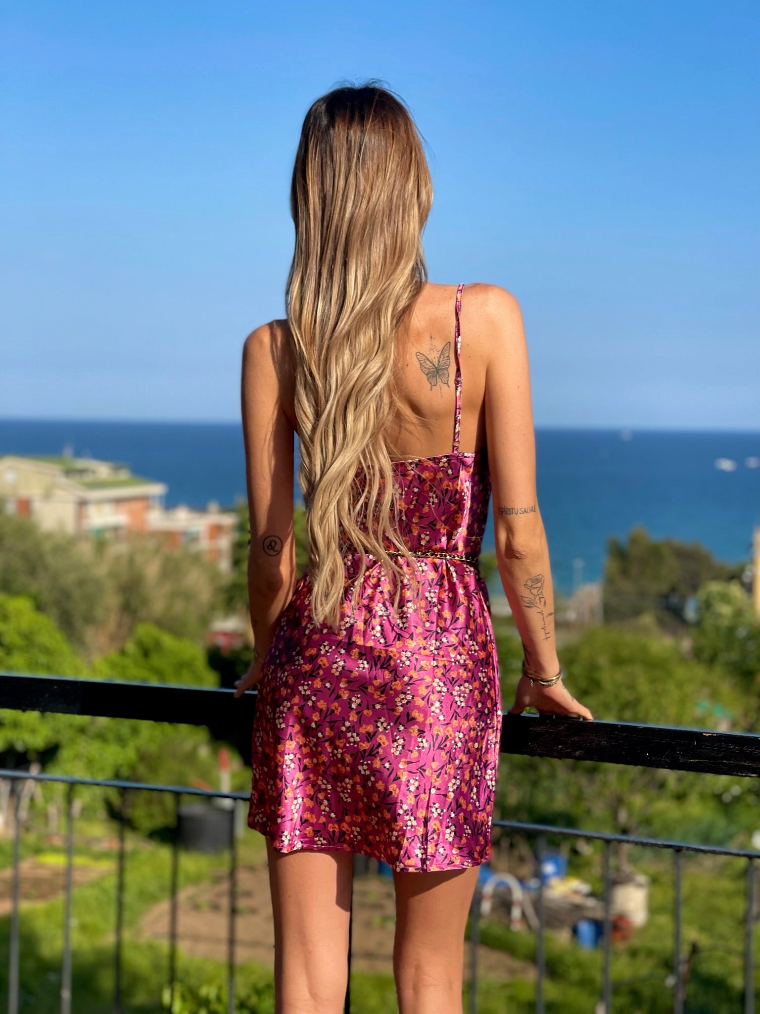 Abito a fiori fuxia - R.a. Boutique 