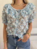 Camicia celeste a manica corta con fiori - R.a. Boutique 