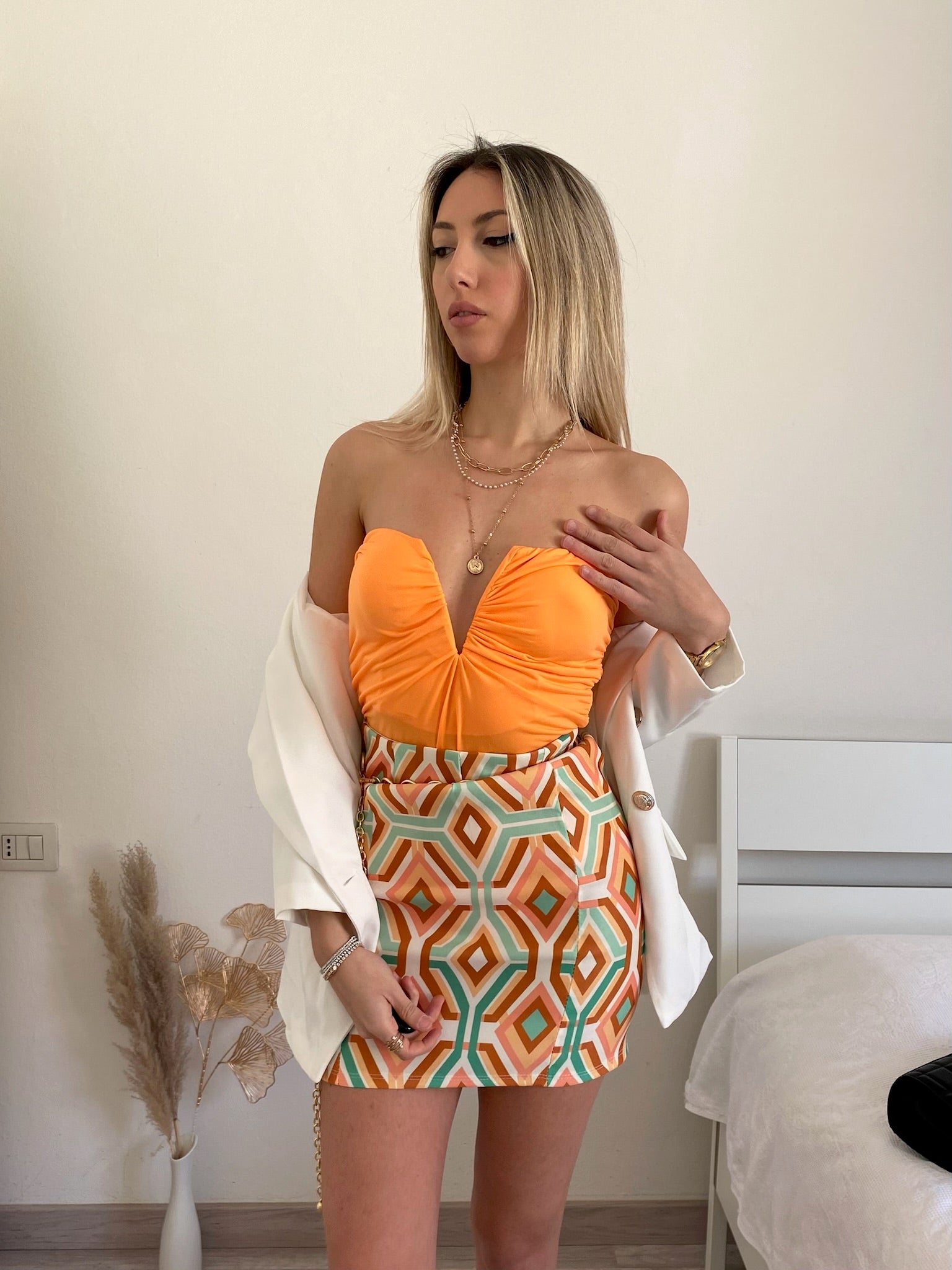 Top arancio con scollo a V - R.a. Boutique 