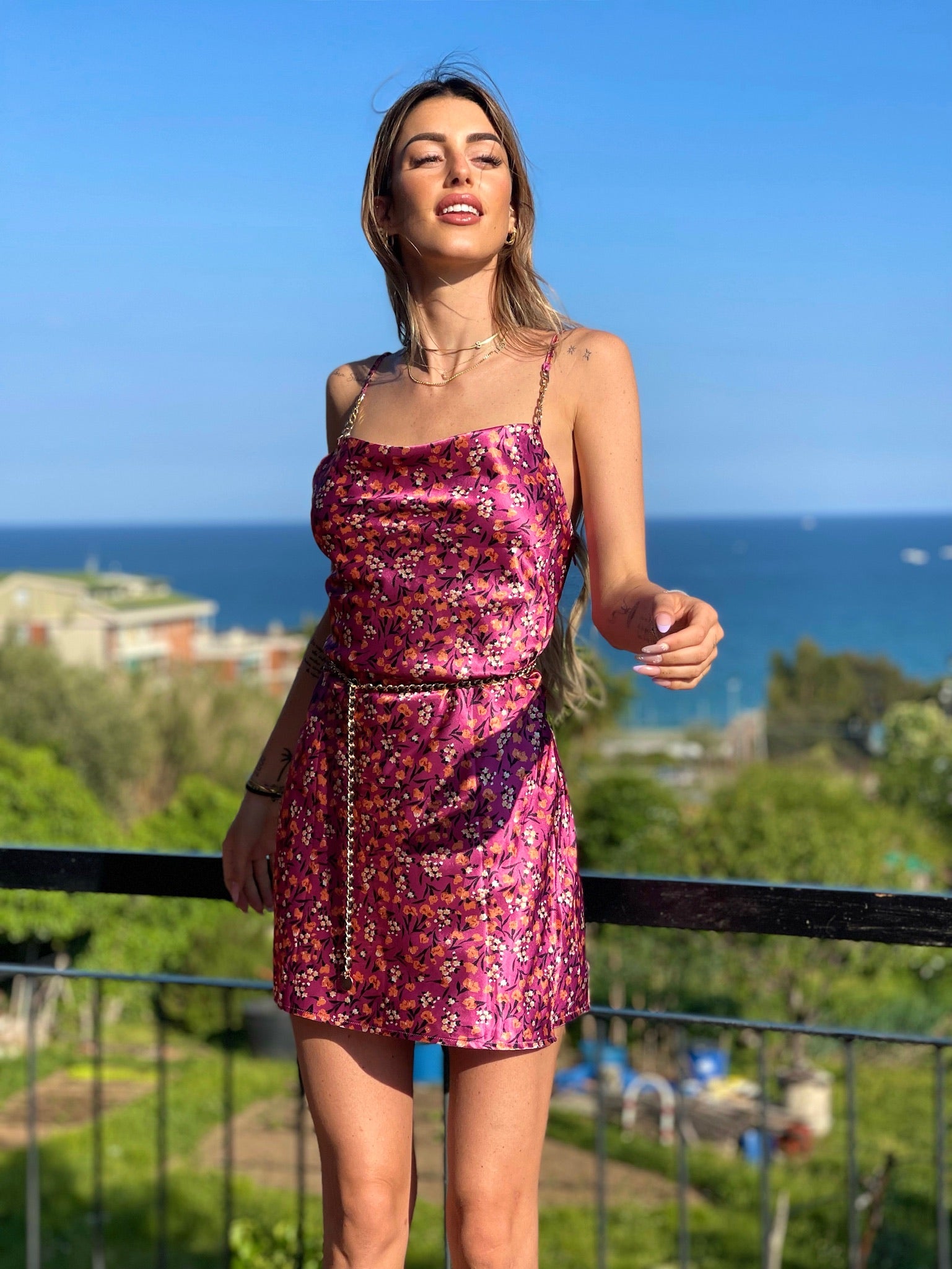 Abito a fiori fuxia - R.a. Boutique 