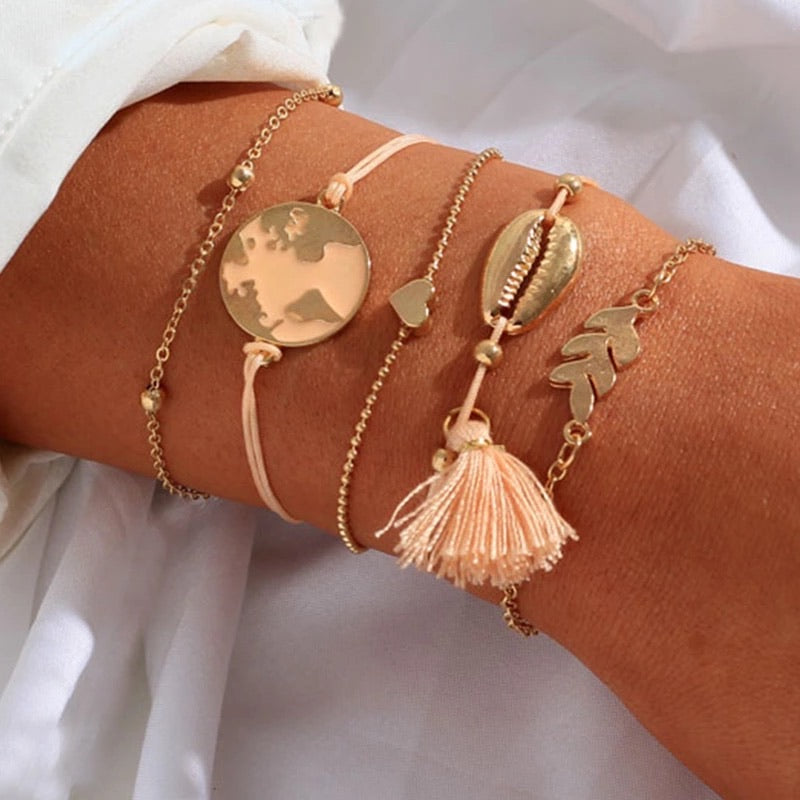 Bracciale con mondo e nappina rosa - R.a. Boutique 