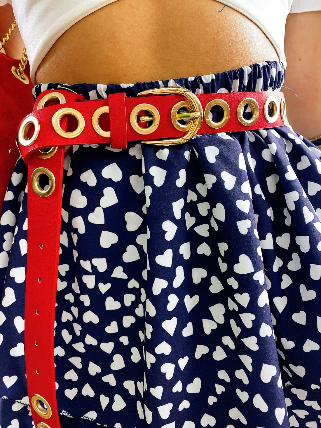 Cinturino con occhielli rosso - R.a. Boutique 