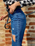 Jeans con strappi - R.a. Boutique 