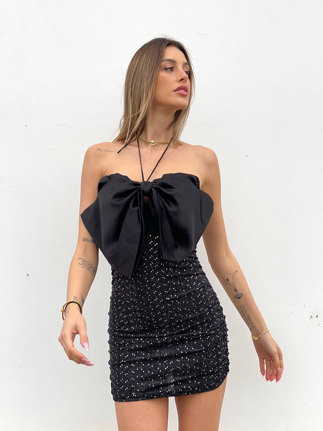 Abito con maxi fiocco e gonna in paillettes - R.a. Boutique 