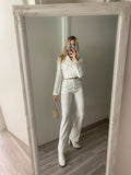 Completo top e pantalone bianco - R.a. Boutique 