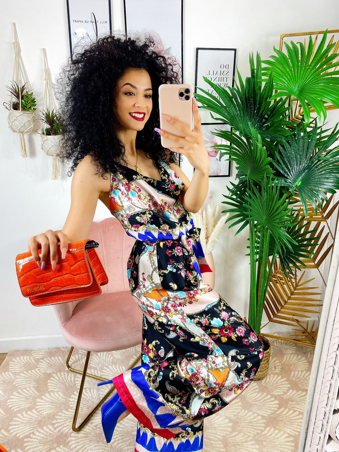 Tuta intera con stampa nera fiori fuxia - R.a. Boutique 