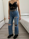 Jeans con strappi wide leg - R.a. Boutique 