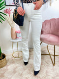 Jeans aderente bianco con zampa - R.a. Boutique 