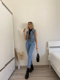 Jeans con strappo e borchie - R.a. Boutique 