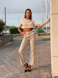 Completo maglia crop e pantalone beige - R.a. Boutique 