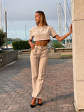 Completo maglia crop e pantalone beige - R.a. Boutique 