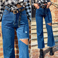 Jeans con strappi - R.a. Boutique 