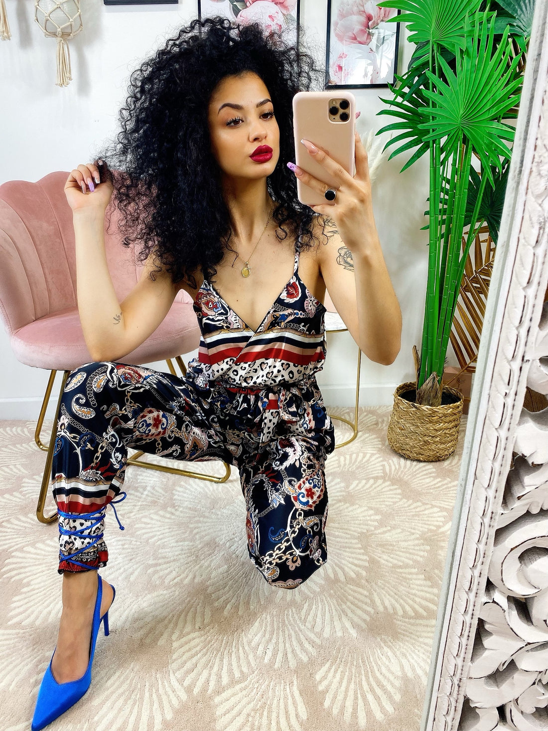 Tuta intera con stampa maculata base nera - R.a. Boutique 